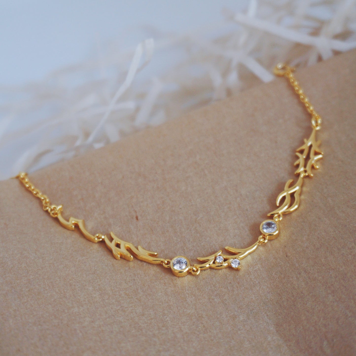 Diamond gold bracelet with Nushu script design